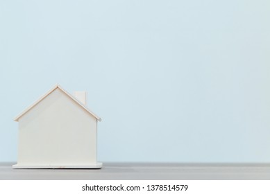 Wooden house model for real estate and construction concepts, new home. - Shutterstock ID 1378514579