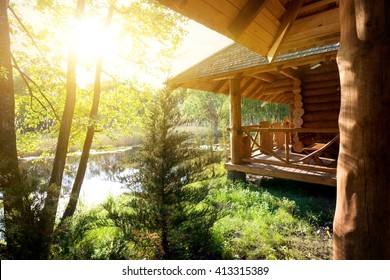 Wooden house and pond - Powered by Shutterstock