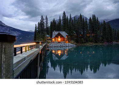 Wooden House Shining In Pine Forest On Emerald Lake In Yoho National Park At Canada