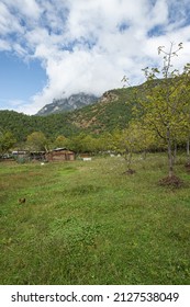 Wooden Houses In The Mountains Of Southwest China