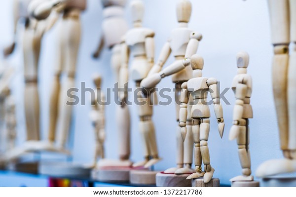 Wooden Human Artistic Action Figures Stationery Stock Photo (Edit Now