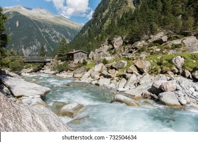 Wooden Hut On The Wild River