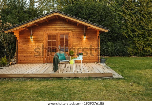 Wooden\
hut in spring. Drink tea in the garden when the weather is nice.\
Garden shed for vacation. Nice garden in Germany.\
