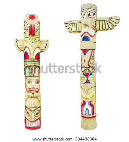 Wooden indian colorful totem pole isolated on white background