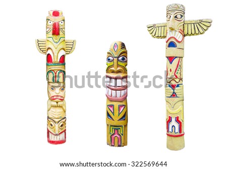 Wooden indian colorful totem pole isolated on white background