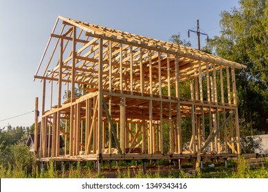 Wooden Interior Frame Of A New House Under Building, Architectural Residential Construction Stick Built Home Framework.