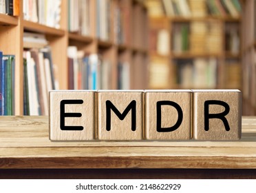 Wooden irregular blocks for letters on library background. EMDR on woden blocks. - Shutterstock ID 2148622929