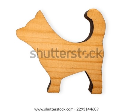 Wooden isolated dog figurine taken from above 