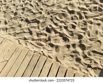 Wooden Jetty On A Sand Beach