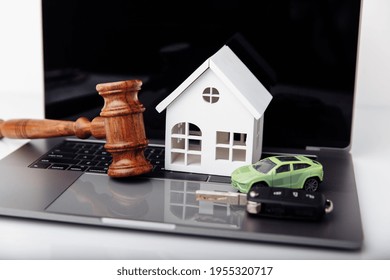 Wooden Judge Gavel With House And Car Key. Auction And Bidding Concept