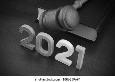 Wooden Judge Gavel, Legal Book And Numbers 2021. New Laws And Rules In Year 2021.