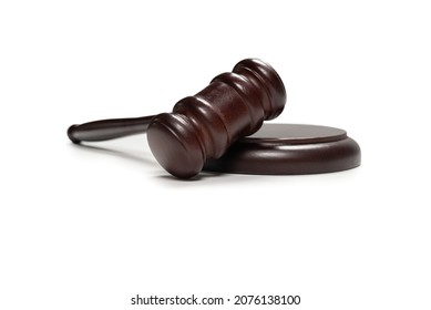 Wooden judge gavel and soundboard isolated on a white background. Justice of law system conceptual.