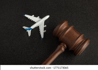 Wooden Judges Gavel And Toy Plane. Aviation Law