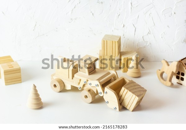 Wooden kids toys. Blocks and\
bricks. Eco life style for childrean and Minimalism for\
parents.
