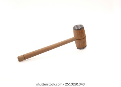 Wooden kitchen meat tenderizer with metal tip. Background - Powered by Shutterstock