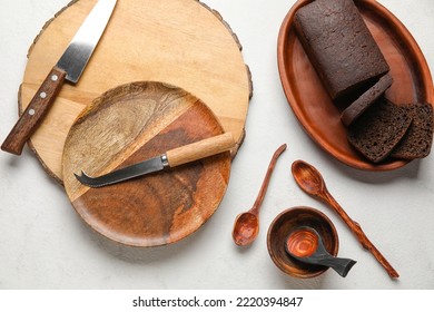 Wooden Kitchen Supplies With Bread On White Background