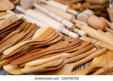 Wooden kitchenware and decorations sold on Easter market in Vilnius. Lithuanian capitals annual traditional crafts fair is held every March on Old Town streets - Shutterstock ID 2244785703