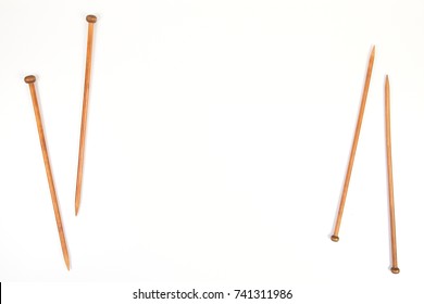 Wooden Knitting Needles On White Background