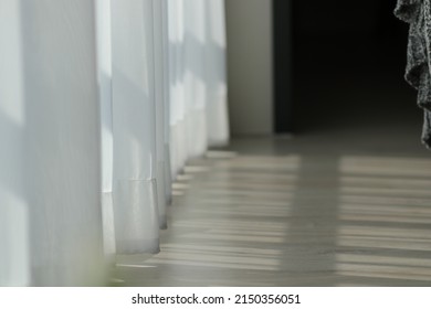 Wooden Laminate Floor With Shadow Drop And Copy Space. White Curtains For House Decor, Apartment, Real Estate, Property, Living, Hotel. Opaque And  Translucent White Curtain In Modern Luxury Bedroom.