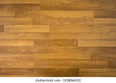 Wooden laminate pattern texture background. Wood floor parquet brown colour hardwood