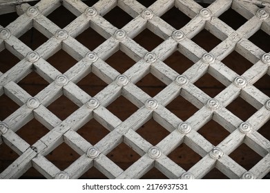 Wooden Latticework Of An Old Wooden Building Painted White