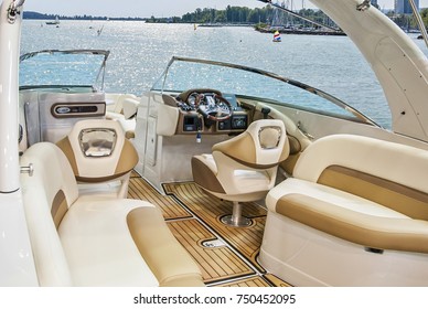  Wooden and leather Interior of luxury yacht. Cockpit of yacht at sea