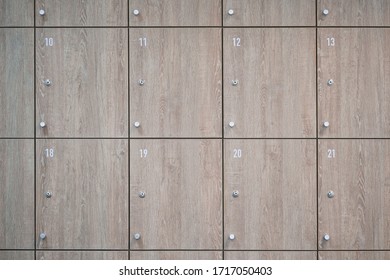 Wooden Lockers In Locker Room At Office.