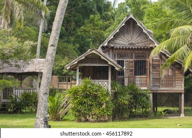 A Wooden Malay Village House On Stilts, Malaysia.