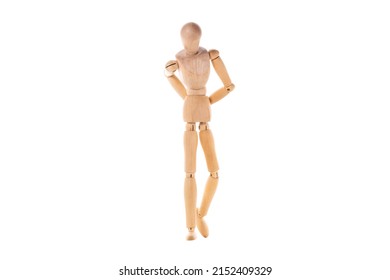 wooden man walks sad with his hands behind his back isolated on white background. High quality photo