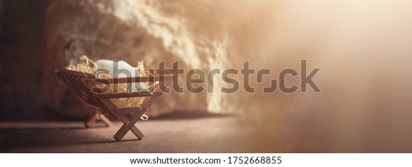 Wooden manger and star of Bethlehem in cave,\
nativity scene background. Christian Christmas concept. Birth of\
Jesus Christ. Jesus is reason for season. Salvation, Messiah,\
Emmanuel, God with us,\
hope.