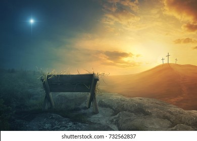 A wooden manger and three wooden crosses
