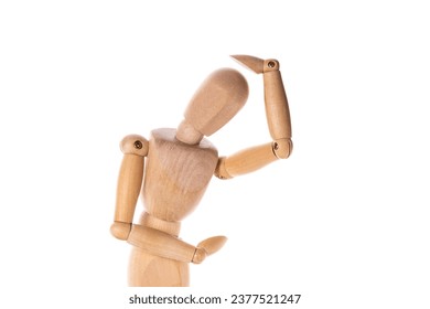 A wooden mannequin with its arm raised in the air. This image can be used for various purposes, such as illustrating concepts of celebration, victory, or even as a symbol of teamwork. - Powered by Shutterstock