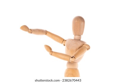 A wooden mannequin with its arms raised high in the air. This versatile image can be used to represent concepts such as freedom, celebration, or creativity. - Powered by Shutterstock