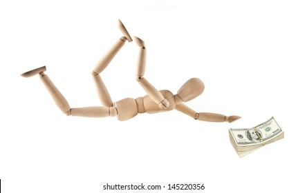 Wooden mannequin falls and stretches North American dollars for a pack