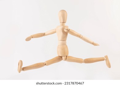 Wooden mannequin happy jump on white background. Creative happiness concept. - Powered by Shutterstock