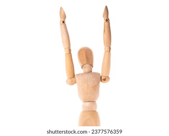 A wooden mannequin with his arms raised in the air. This versatile image can be used to depict various concepts such as celebration, victory, excitement, or even yoga poses. - Powered by Shutterstock