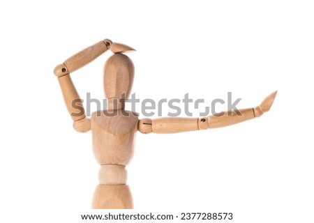A wooden mannequin holding his arms out. This versatile image can be used to convey concepts such as welcoming, open-mindedness, creativity, or the idea of reaching out for help or support.