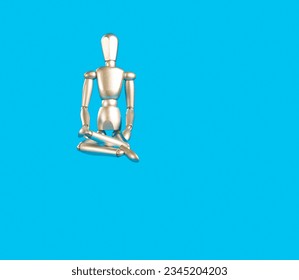 Wooden mannequin in the lotus position on a blue background. - Powered by Shutterstock