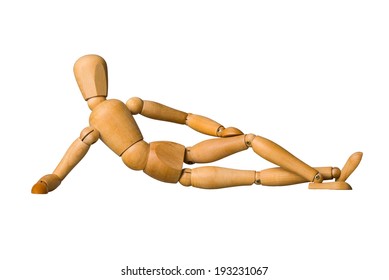 Wooden mannequin lying down isolated on white - Powered by Shutterstock