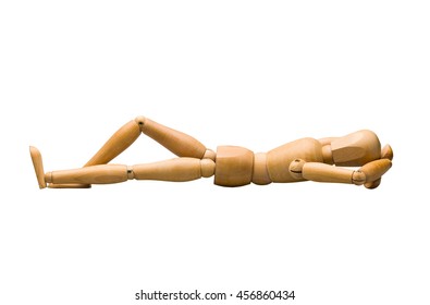 Wooden mannequin lying down, isolated on white. - Powered by Shutterstock