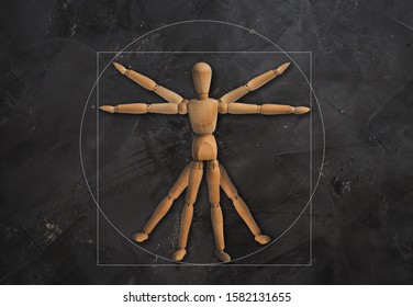 wooden mannequin  on black concrete wall - Powered by Shutterstock