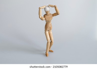 Wooden Mannequin As A Patient With Bandaged Head