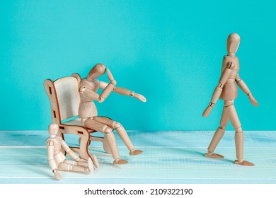 Wooden Mannequins As Husband Leaving The Family And His Left Wife And Child Facing The Divorce