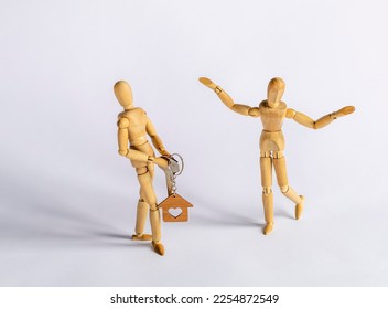 wooden mannequins as rich man with property and his bride - Shutterstock ID 2254872549