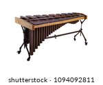 Wooden marimba, musical instrument isolated on white background.