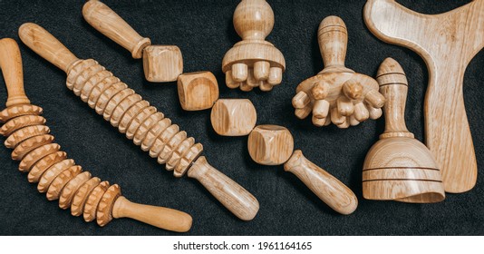 Wooden massage tools to stimulate the lymphatic system and improve circulation. Treatment to eliminate cellulite. - Shutterstock ID 1961164165