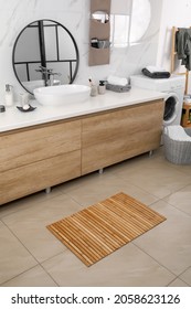 Wooden Mat On Floor In Bathroom. Interior Design