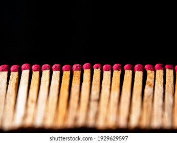 Wooden Matches With Red Sulfur Heads On A Black Background. Fire Ignition Matches. Matchbox. Red Sulfur. Black Background. 