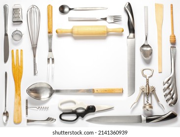 Wooden And Metal Kitchen Utensils. Tools For Cooking. White Background. Flat Lay