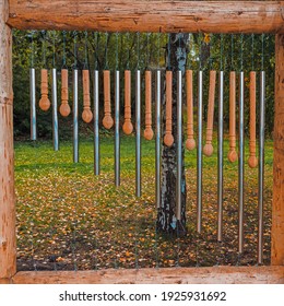 Wooden And Metal Wind Chime In The Street. Bbackground Musical Decoration.